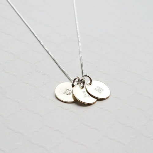 mom necklace for 3 kids with children's initials on tiny sterling silver discs
