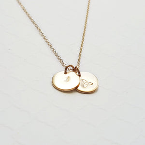 custom yellow gold necklace with tiny stamped initial discs