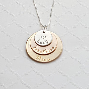 sterling silver, yellow and rose gold mixed metal three-layer mom necklace with kids' names