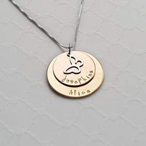 yellow and rose gold mixed metal mom necklace with kids' names and butterfly charm