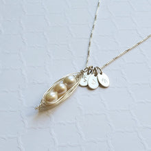 Load image into Gallery viewer, Wire-wrapped sterling silver pea pod necklace with freshwater pearls and initial charms