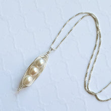 Load image into Gallery viewer, Wire-wrapped sterling silver pea pod necklace with freshwater pearls