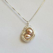 Load image into Gallery viewer, Wire-wrapped sterling silver bird&#39;s nest necklace with freshwater pearl eggs