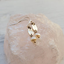 Load image into Gallery viewer, sterling silver hook earrings with freshwater pearls and a stamped flower design