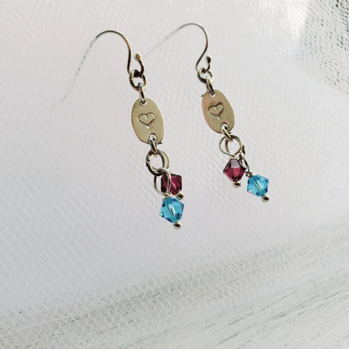 sterling silver hook earrings with a stamped heart disc and two Swarovski birthstones
