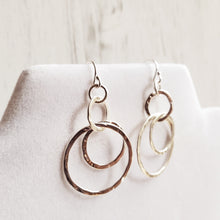 Load image into Gallery viewer, dangly silver hook earrings with three interlocking hammered sterling circles