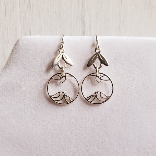 silver hook earrings with laurel leaves and a mama and baby bird