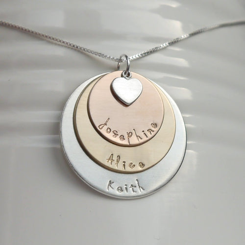 sterling silver, yellow and rose gold three-layer mixed metal mom necklace with kids' names and heart charm