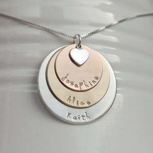 sterling silver, yellow and rose gold three-layer mixed metal mom necklace with kids' names and heart charm